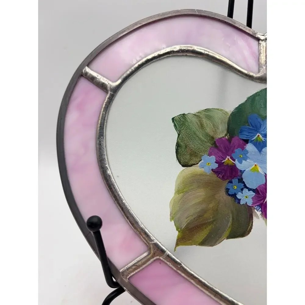 Stained glass heart. With a hand painted floral design.